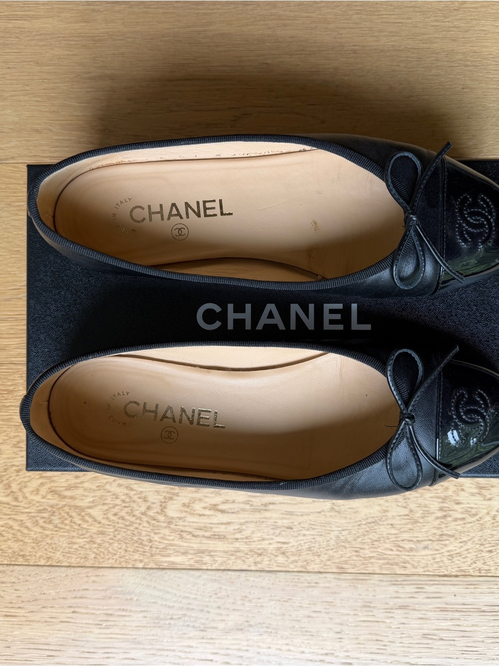 CHANEL Black Ballet Flats with Patent Cap Toe